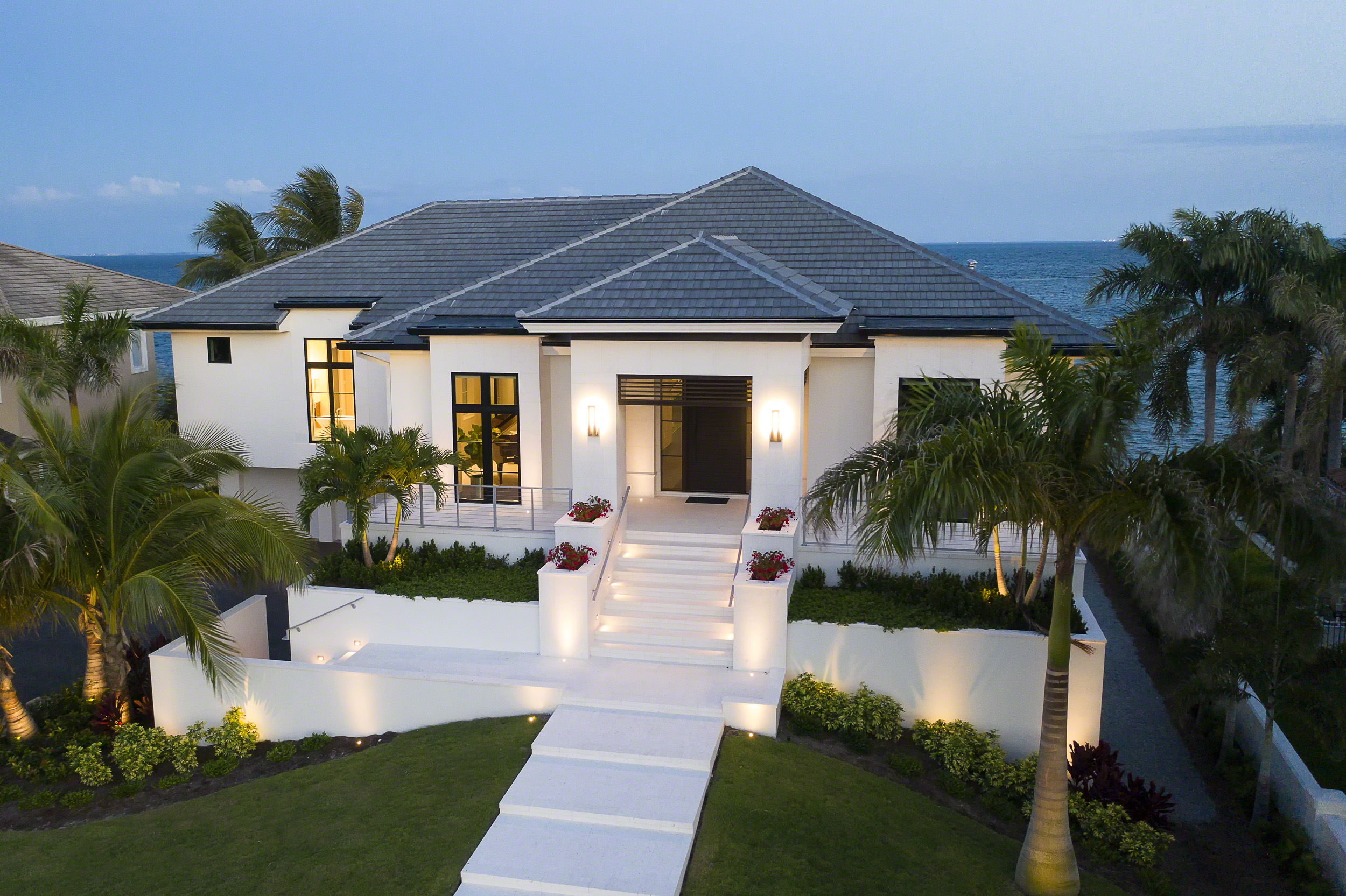 Contemporary white waterfront home in St. Petersburg, FL, designed by Behar Peteranecz Architecture